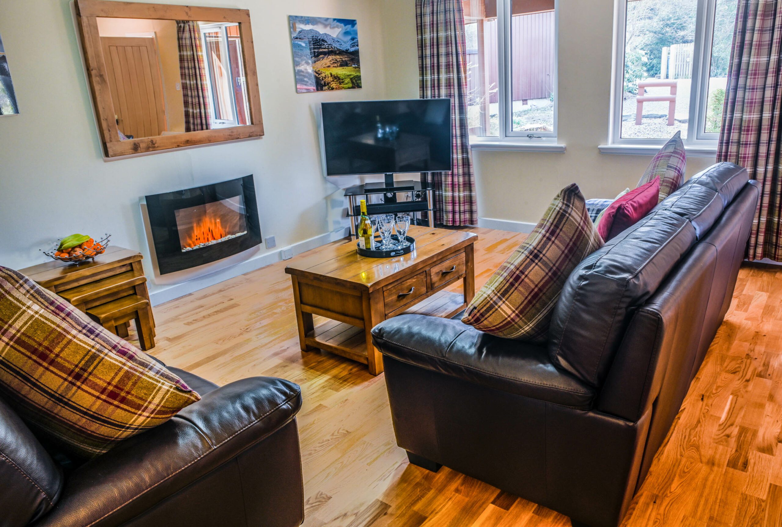 Spacious living area with Smart TV home cinema system at Birchbrae Highland Lodges, nr Glencoe & Fort William.