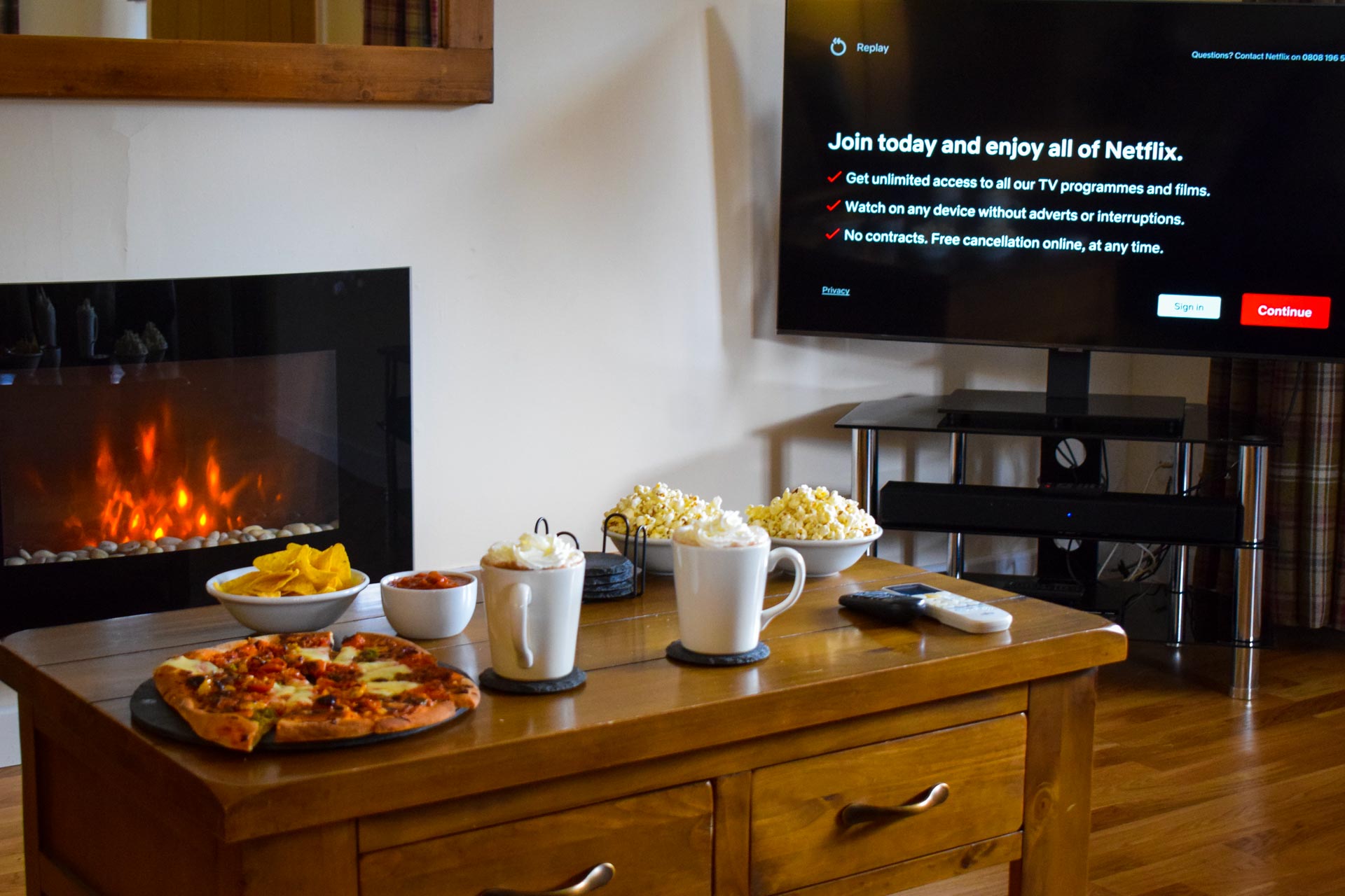 Enjoy movie nights in the spacious lounges at Birchbrae Highland Lodges with Smart TV home Cinema system and wall mounted flame effect fire.