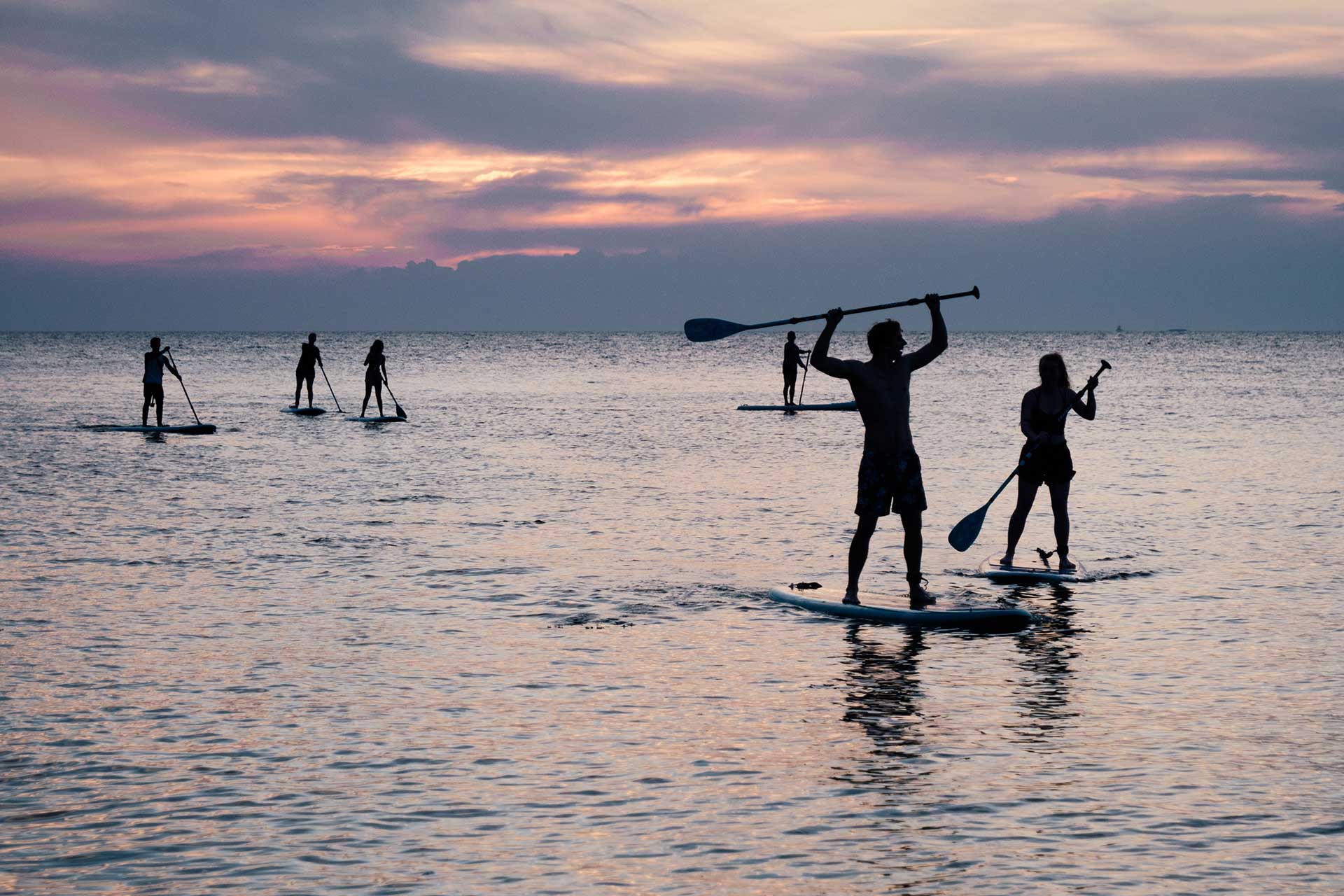 Try stand up paddle boarding from a local experiene provided in Glencoe.